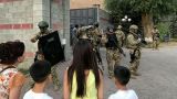 Спецслужбы: Сторонники Атамбаева использовали детей в качестве щита
