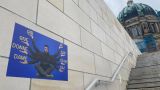 Шива-Зеля — Германию заполонили плакаты с главным киевским попрошайкой