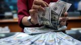 Эксперт: В условиях кризиса США попытаются утопить весь мир в новых долларах